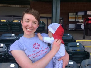 Sheila O'Rourke and a fan enjoy a break in the action during the 2017 War of the Roses charity softball game.